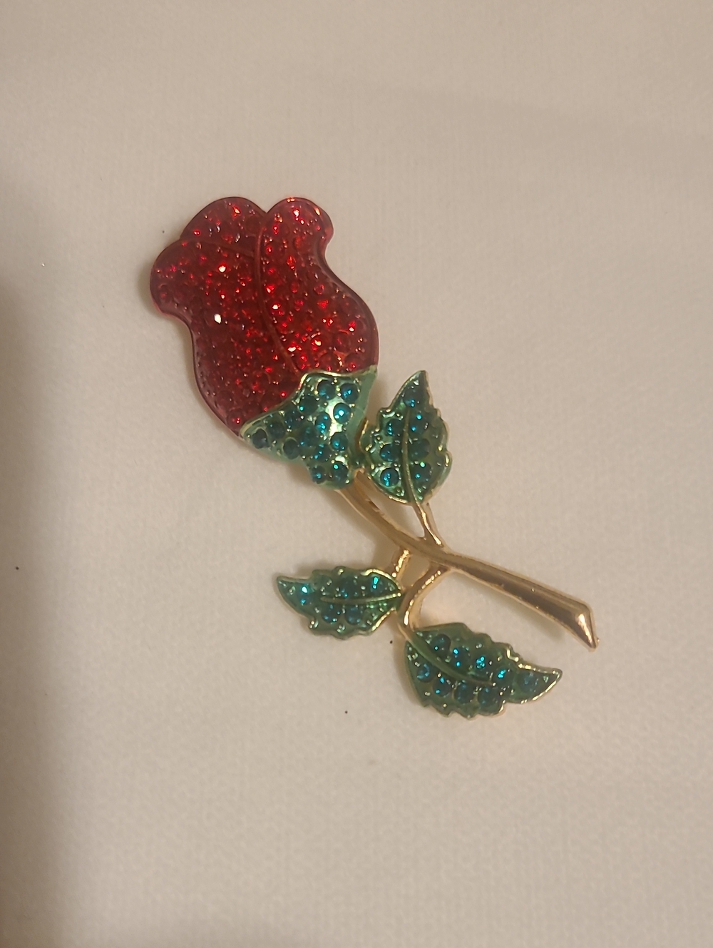 Red Crystal Rose Brooch with Green Accented Leaves